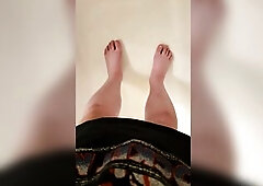Trans guy voids urine on his feet